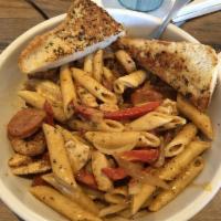 Cajun Pasta · Blackened shrimp, chicken, and Andouille sausage sautéed with onions and peppers in our from...