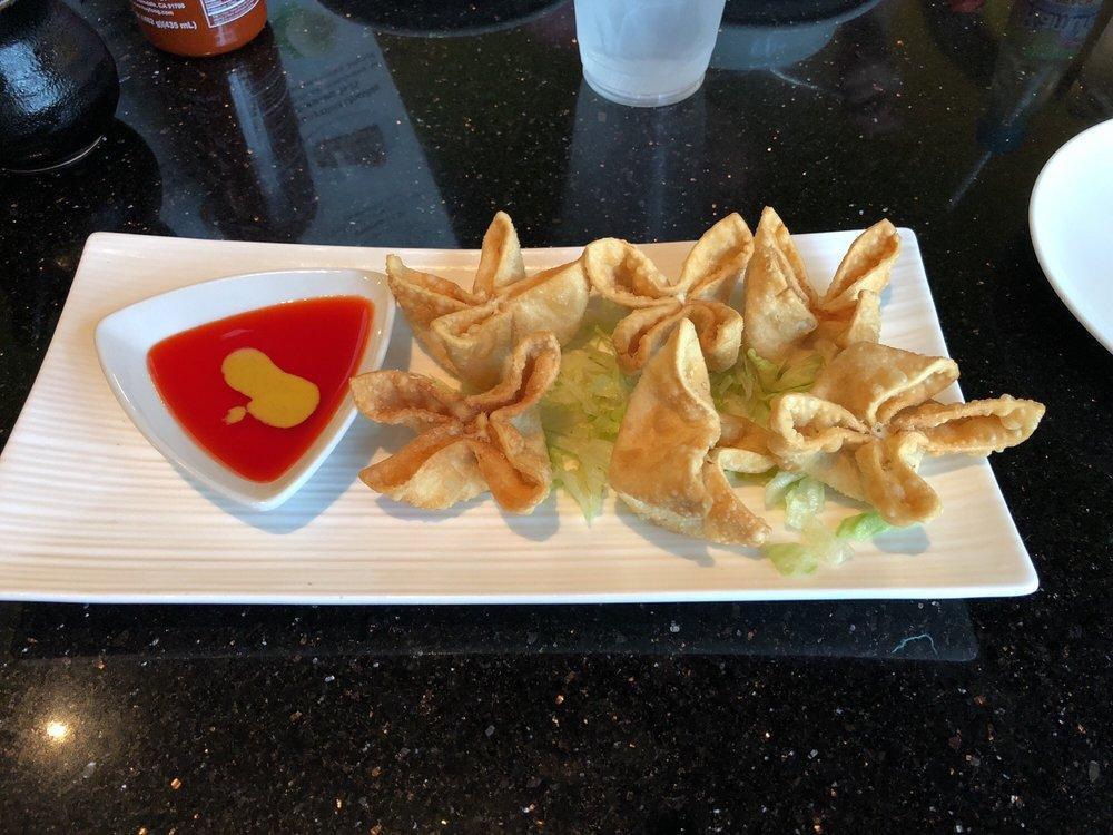 6 Spinach Cheese Wontons · Extra crispy wontons filled with crab meat, with spinach in a cream cheese base.