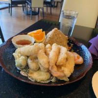 Tempura · Jumbo shrimps and mixed veggies deep fried in a lacy batter.