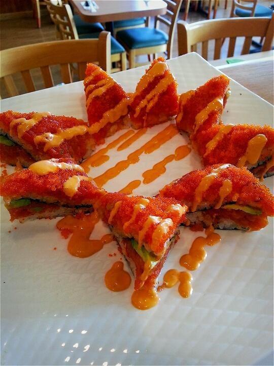 Sunny Roll · Spicy tuna, avocado, crunch and topping masago with spicy mayo.