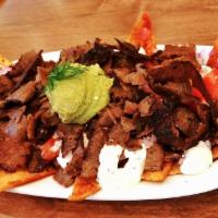 Gyro Meat Platter · Slices of tender gyro meat, ripe sliced tomatoes, fresh mint, red onions, tzatziki, toasted ...