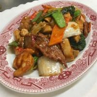 Happy Family · Jumbo shrimp, scallops, roast pork, chicken and choice mixed Chinese vegetables stir-fried o...