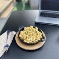 Truffle Mac · Truffle Mac & Cheese made with cavatappi pasta, a selection of imported cheeses, fresh cream...
