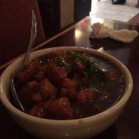 Chicken Manchurian · Diced chicken cooked in a spicy Manchurian sauce. Spicy. Not served with rice.