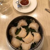 Steamed Shrimp Dim Sum · A Cantonese special of steamed dumplings, served with chili sauce.