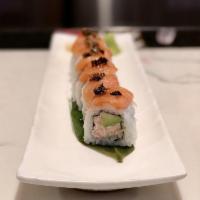 Truffle Salmon Roll · Salmon on top, crab meat, avocado, and truffle oil.