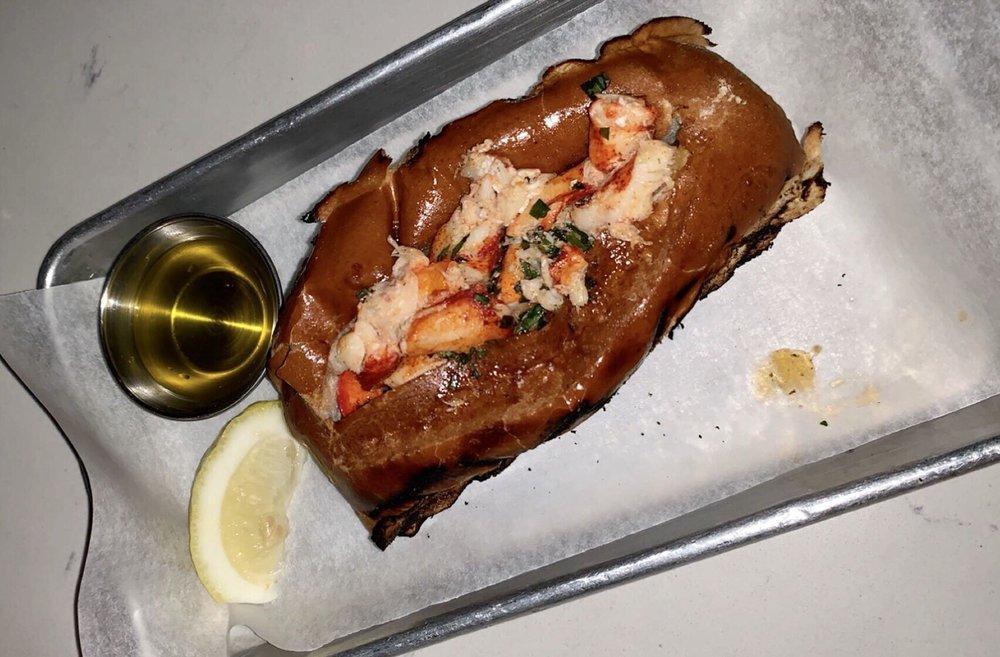 Lobster Roll · Tarragon butter, sea salt, and a brioche bun.