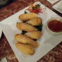 Vegetarian Spring Rolls · Bean thread, carrot, cabbage in a crispy spring roll wrapper, and plum dipping sauce.