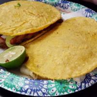 Mulita · Two Tortillas (one on top of the other) with melted cheese inside. Fill it with your choice ...