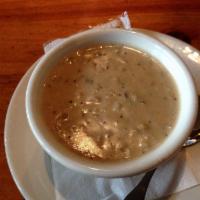 New England Clam Chowder · A hearty clam chowder full of clams, potatoes, and sauteed veggies in a rich cream base.