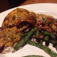 Crab Stuffed Fish · Blackened tilapia stuffed with a lump crab cake and  smothered in our homemade Pontchartrain...