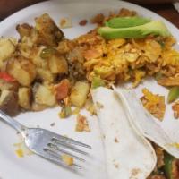 Mexican Scramble · Chorizo, onion, bell pepper, tomato, tortilla strips, and scrambled eggs. Topped with chedda...
