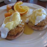 Dungeness Crab Benedict · 2 tasty crab cakes resting on an English muffin, topped with 2 poached eggs and  hollandaise...