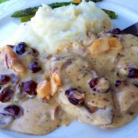 Pork Loin Sautee · Luscious Madeira wine sauce with apricots and cranberries.