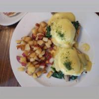 Rabbits Benedict · 2 poached medium eggs, Garlic sautéed spinach and mushroom on a toasted English muffin, topp...