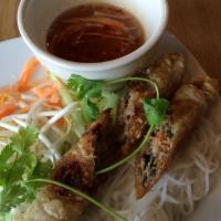 2 Vietnamese Egg Rolls · Pork, chicken, carrots and vermicelli noodles wrapped in rice paper and fried till golden br...