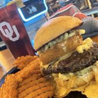 Mac and Cheese Burger · Beef, mac and cheese, onion ring, grilled onions and BBQ sauce. Burger grilled to a medium-w...