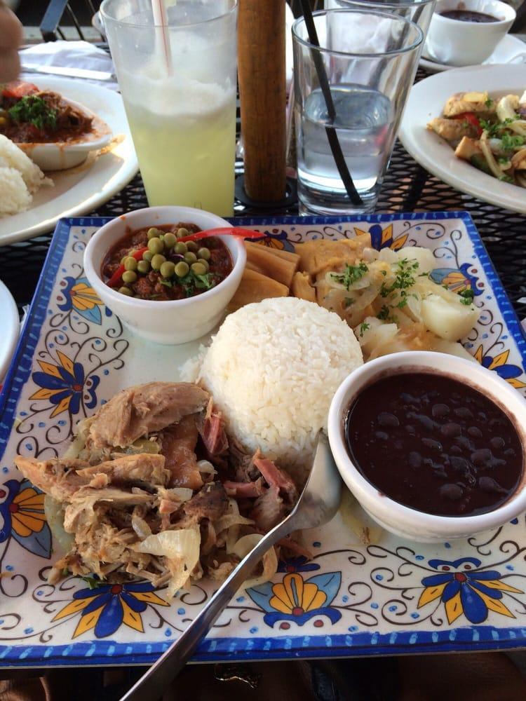 Lechon Asado · Roasted pulled pork. Served with an option of 2 side dishes.