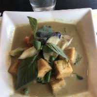 Green Curry · Zucchini, green bean, petite peas, Thai basils.