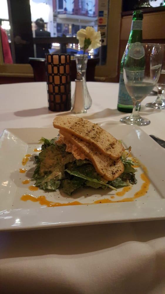 Caesar Salad · Freshly tossed romaine with homestyle croutons in a light zesty Caesar dressing topped with grated percorino-romano cheese.