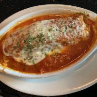 Lasagna · Lasagna noodles, ground beef, mozzarella and ricotta cheese in a marinara sauce. Baked and t...