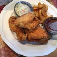 Broasted Chicken · 1 1/2 chicken broasted and served with white bread, a taste of apple slaw and Texas sidewind...