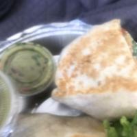 Vegetarian Burrito · Served with grilled veggies., onions, carrots, green peppers and burrito base ingredients. A...