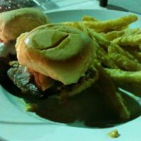 Prime Rib Sliders · 3 shaved prime rib sliders topped with Provolone cheese, fried onion straws, and bistro sauc...