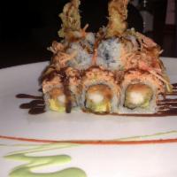 Angry Dragon Roll · Spicy tuna, avocado and shrimp tempura topped with spicy crab and eel sauce.