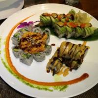 Lobster Tempura Roll · Lobster tempura, cucumber and asparagus topped with avocado, eel sauce, spicy mayo and masag...