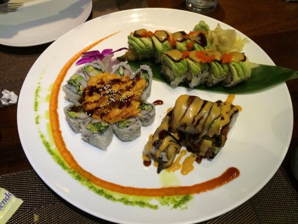 Lobster Tempura Roll · Lobster tempura, cucumber and asparagus topped with avocado, eel sauce, spicy mayo and masago. 