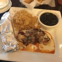 Chori Pollo · Grilled chicken breast with queso fundido on top. Served with rice, beans and 2 flour tortil...