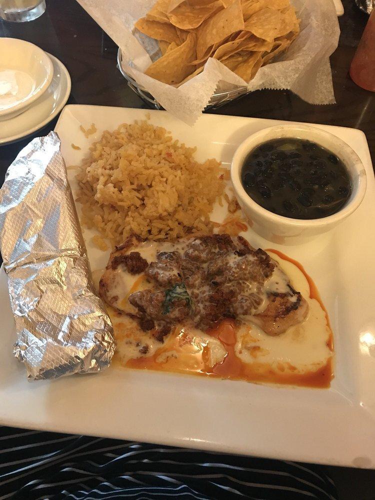 Chori Pollo · Grilled chicken breast with queso fundido on top. Served with rice, beans and 2 flour tortillas.