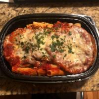 Chicken & Eggplant Parm Sub · Chicken cutlets, wrapped in eggplant, topped with marinara sauce, provolone and grated roman...