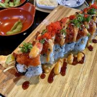 Dragon Roll · In: Shrimp Tempura, Crab, Cucumber
Out: Unagi, Avocado, Scallion, Sesame Seeds
Sauce: Unagi