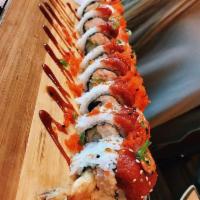 Red Dragon Roll · In: Shrimp Tempura, Avocado, Cucumber, Crab
Out: Spicy Tuna, Masago, Scallion, Sesame Seeds
...