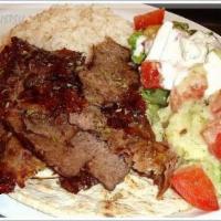 Lamb and Beef Gyros Plate · Marinated, thinly sliced lamb and beef served with rice, a salad and pita bread.