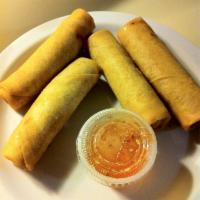 Thai Rolls · Crispy spring rolls stuffed with vegetables, served with sweet and sour sauce. 4 pieces.