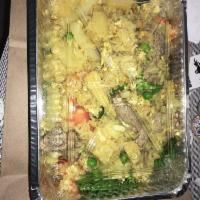 Mango Fried Rice · Stir-fried rice with your choice of protein, eggs, carrots, peas, onions, tomato, scallions,...