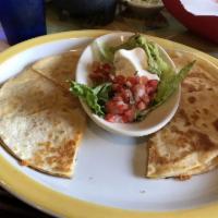 Quesadillas · 2 fresh flour tortillas stuffed with Monterrey Jack and cheddar cheese. Served with pico de ...