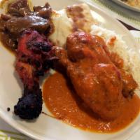 Tandoori Chicken · Chicken marinated overnight in yogurt, spices, and fresh herbs. Served with Basmati Rice and...