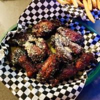 10 Piece Smoked, Fried and Grilled Wings · We take our awesome smoked wings, deep fry them for a crispier coat, then toss them in a sau...