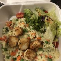 Scallop Lemon Risotto · Pan-seared scallops over lemon risotto with peas, carrots and Romano cheese. Garnished with ...