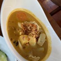 Massaman Curry · Creamy massaman curry paste with coconut milk, tamarind, pineapple, peanuts, onions, potatoe...