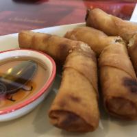 Spring Rolls · Crispy fried vegetable rolls. Served with sweet and sour sauce.