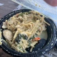 Green Curry · Choice of chicken, pork or beef with bamboo shoot, eggplant and basil leaves in green-coconu...