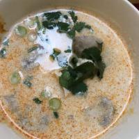 Tom Kha Soup · Chicken in coconut milk soup with galanga, chili, lime juice, lemongrass and kaffir lime lea...