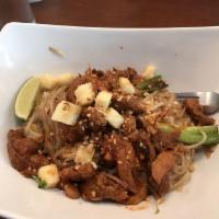 Pad Thai Al Pastor · Traditional pad Thai noodles, topped with pineapple marinated pork and peanut.