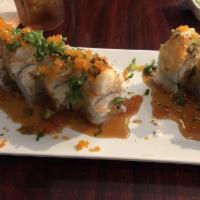 Double Dragon Roll · Baked spicy crab and scallop on top of shrimp tempura roll. 