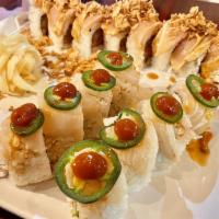 911 Roll · Spicy yellowtail, jalapeno, and avocado on top of Cali roll. 